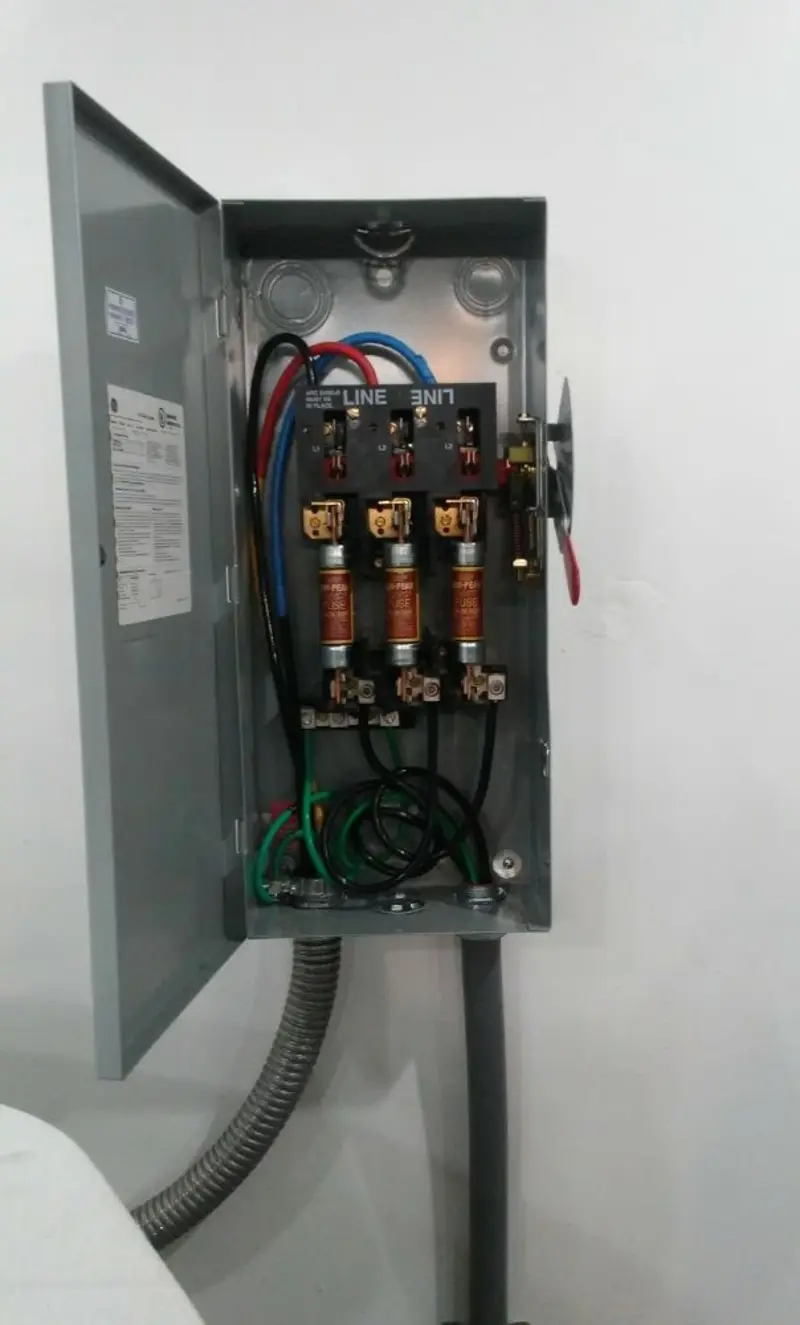 Three-phase disconnect switch installed for Smoke Detector Installation in Teague